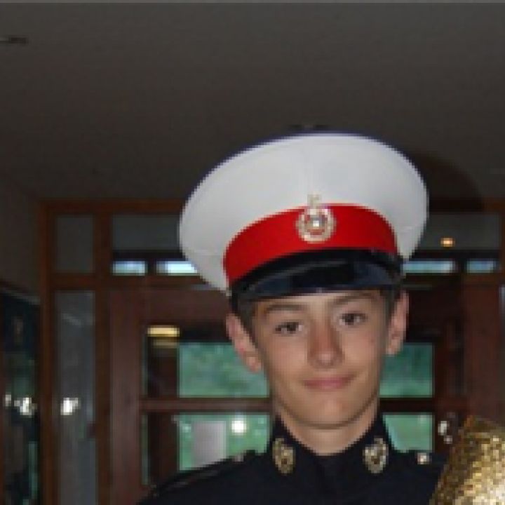Royal Marines Cadet carries the flame 